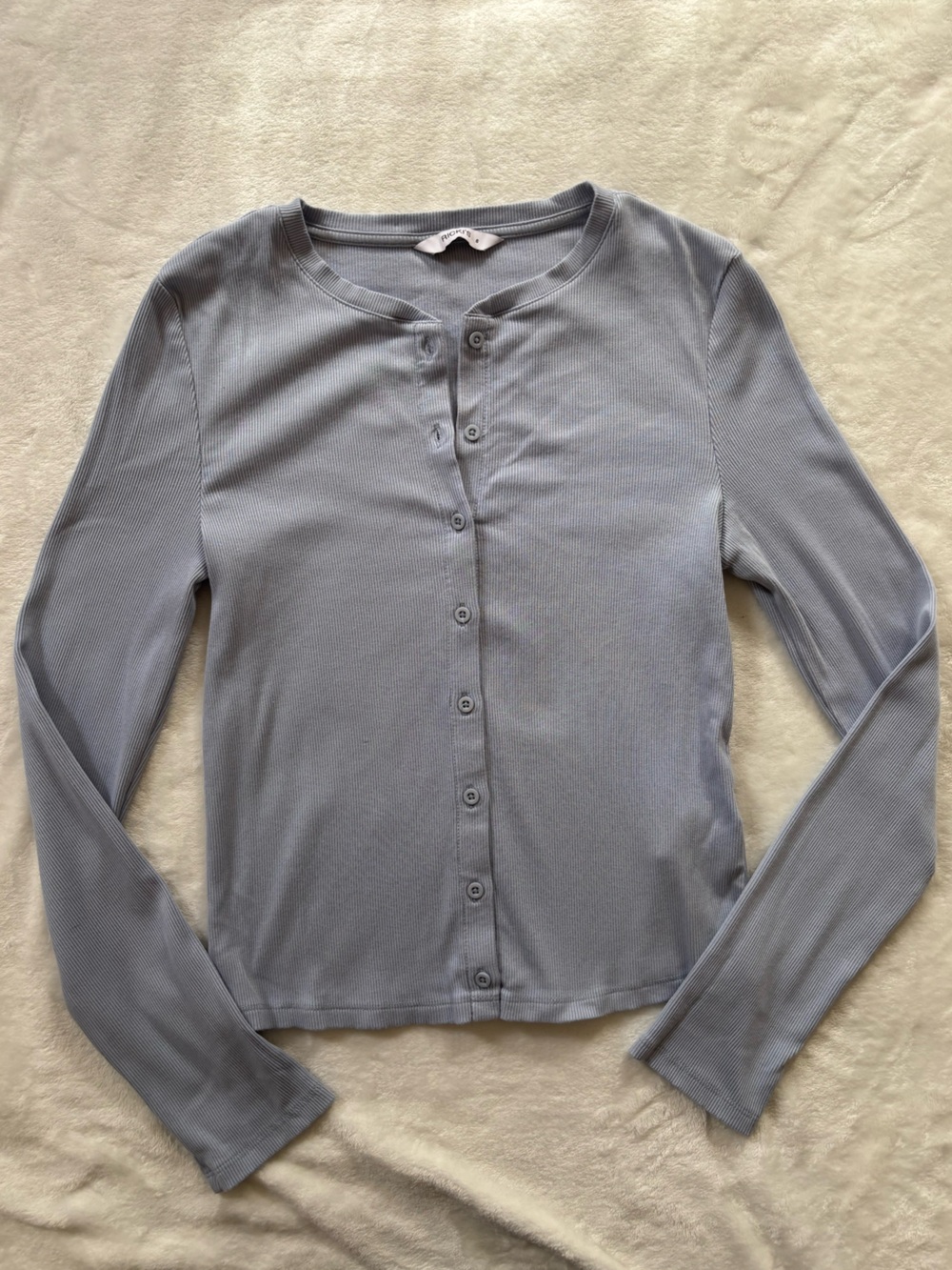 Ricki’s long sleeve button up ribbed knit top